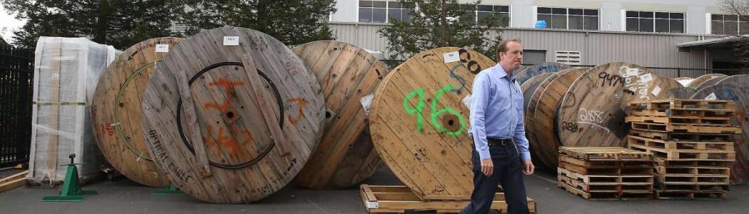 Dane Jasper standing next to fiber cable